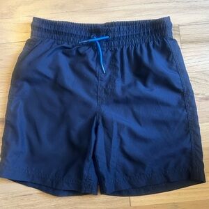 Old Navy boy’s navy swim trunks with royal blue drawstring. Size 10/12.